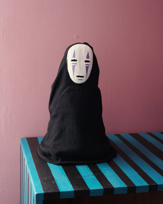 No Face doll