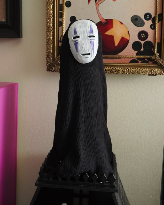 No Face doll